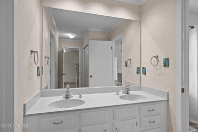 Stunning 4-bedroom, 3.5-bathroom home nestled on Hole 15 of the on Brandywine Bay Golf Club in North Carolina - for sale on GolfHomes.com, golf home, golf lot