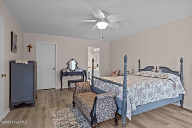 Stunning 4-bedroom, 3.5-bathroom home nestled on Hole 15 of the on Brandywine Bay Golf Club in North Carolina - for sale on GolfHomes.com, golf home, golf lot