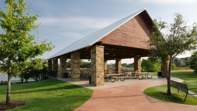 Huge 3-CAR GARAGE for protecting all your vehicles from on Lantana Golf Club in Texas - for sale on GolfHomes.com, golf home, golf lot