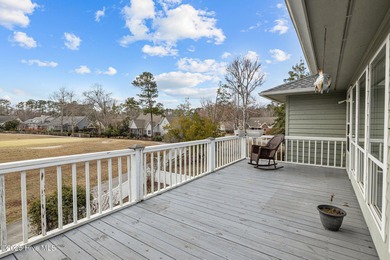 Stunning 4-bedroom, 3.5-bathroom home nestled on Hole 15 of the on Brandywine Bay Golf Club in North Carolina - for sale on GolfHomes.com, golf home, golf lot