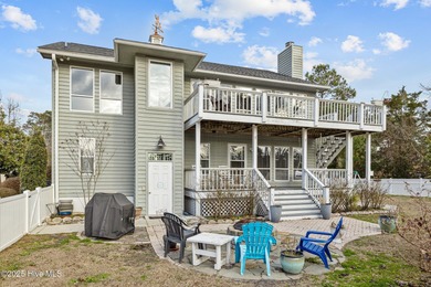 Stunning 4-bedroom, 3.5-bathroom home nestled on Hole 15 of the on Brandywine Bay Golf Club in North Carolina - for sale on GolfHomes.com, golf home, golf lot