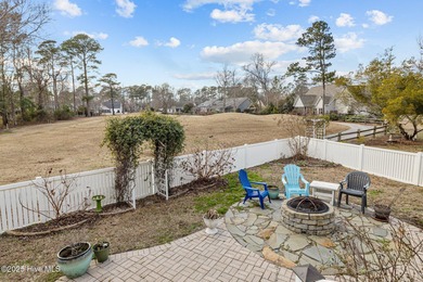 Stunning 4-bedroom, 3.5-bathroom home nestled on Hole 15 of the on Brandywine Bay Golf Club in North Carolina - for sale on GolfHomes.com, golf home, golf lot