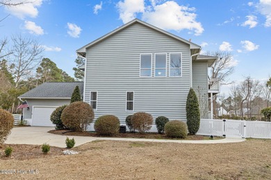 Stunning 4-bedroom, 3.5-bathroom home nestled on Hole 15 of the on Brandywine Bay Golf Club in North Carolina - for sale on GolfHomes.com, golf home, golf lot