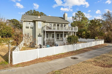 Stunning 4-bedroom, 3.5-bathroom home nestled on Hole 15 of the on Brandywine Bay Golf Club in North Carolina - for sale on GolfHomes.com, golf home, golf lot