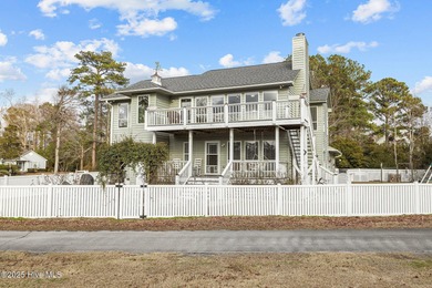 Stunning 4-bedroom, 3.5-bathroom home nestled on Hole 15 of the on Brandywine Bay Golf Club in North Carolina - for sale on GolfHomes.com, golf home, golf lot