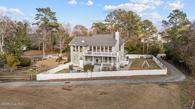 Stunning 4-bedroom, 3.5-bathroom home nestled on Hole 15 of the on Brandywine Bay Golf Club in North Carolina - for sale on GolfHomes.com, golf home, golf lot