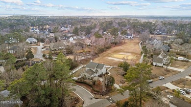 Stunning 4-bedroom, 3.5-bathroom home nestled on Hole 15 of the on Brandywine Bay Golf Club in North Carolina - for sale on GolfHomes.com, golf home, golf lot