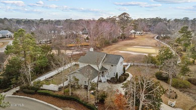 Stunning 4-bedroom, 3.5-bathroom home nestled on Hole 15 of the on Brandywine Bay Golf Club in North Carolina - for sale on GolfHomes.com, golf home, golf lot