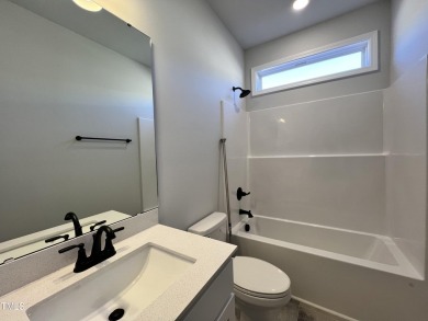 Premium lot! Beautiful new ranch home in Clayton's Ashcroft on Riverwood Golf and Athletic Club in North Carolina - for sale on GolfHomes.com, golf home, golf lot