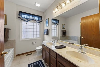 Welcome to one of the most exceptional Greenbriar models to ever on Carillon Lakes 3 Hole Course in Illinois - for sale on GolfHomes.com, golf home, golf lot