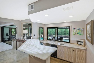 Perfectly positioned on a quiet cul-de-sac in the heart of on Club at Pelican Bay Golf Course in Florida - for sale on GolfHomes.com, golf home, golf lot