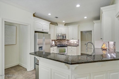 This is THE ONE! Exceptionally cared for, one owner home, in the on Lake Caroline Golf Club in Mississippi - for sale on GolfHomes.com, golf home, golf lot