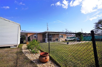 2/2-1 / Carport.  Waterfront with NO Flood Zone (X-500).
 on Port Charlotte Golf Club in Florida - for sale on GolfHomes.com, golf home, golf lot