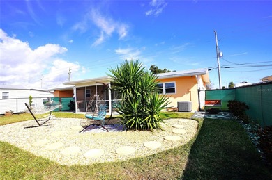 2/2-1 / Carport.  Waterfront with NO Flood Zone (X-500).
 on Port Charlotte Golf Club in Florida - for sale on GolfHomes.com, golf home, golf lot