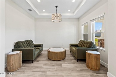 Experience luxury living in the gated Windchase section of on Halifax Plantation Golf Club in Florida - for sale on GolfHomes.com, golf home, golf lot