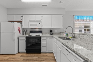 This move-in ready third-floor condo in the River Oaks community on River Oaks Golf Plantation  in South Carolina - for sale on GolfHomes.com, golf home, golf lot