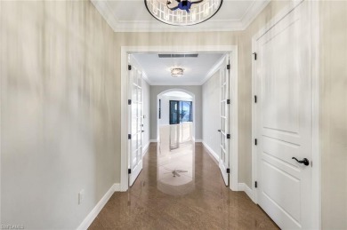 As you enter the foyer from the private elevator, you will be on The Colony Golf and Country Club in Florida - for sale on GolfHomes.com, golf home, golf lot