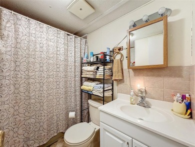SNOWBIRDS OR HOMEOWNERS WELCOME- YOU OWN the land. 2 Bedroom on Glen Lakes Country Club in Florida - for sale on GolfHomes.com, golf home, golf lot