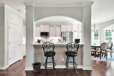 Welcome to this breathtaking 5-bedroom retreat, perfectly on Beau Rivage Golf and Resort in North Carolina - for sale on GolfHomes.com, golf home, golf lot