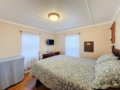 SNOWBIRDS OR HOMEOWNERS WELCOME- YOU OWN the land. 2 Bedroom on Glen Lakes Country Club in Florida - for sale on GolfHomes.com, golf home, golf lot