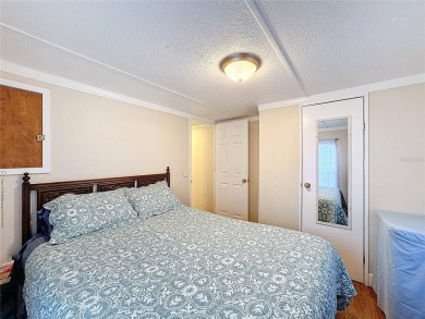 SNOWBIRDS OR HOMEOWNERS WELCOME- YOU OWN the land. 2 Bedroom on Glen Lakes Country Club in Florida - for sale on GolfHomes.com, golf home, golf lot