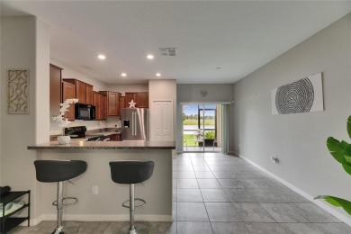 Welcome to 12952 Utopia Gardens Way - Tranquil Living with Water on Summerfield Crossing Golf Club in Florida - for sale on GolfHomes.com, golf home, golf lot