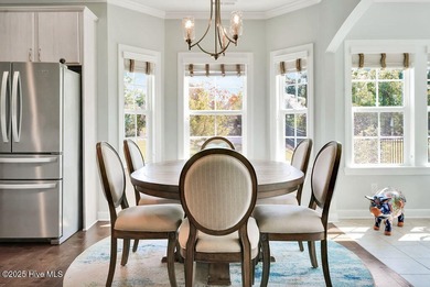 Welcome to this breathtaking 5-bedroom retreat, perfectly on Beau Rivage Golf and Resort in North Carolina - for sale on GolfHomes.com, golf home, golf lot