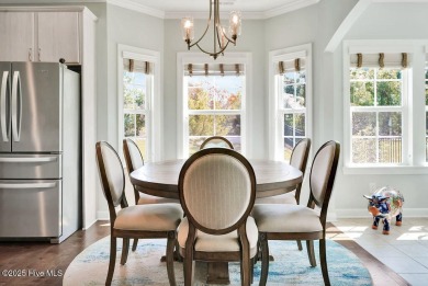 Welcome to this breathtaking 5-bedroom retreat, perfectly on Beau Rivage Golf and Resort in North Carolina - for sale on GolfHomes.com, golf home, golf lot