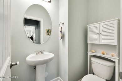 Welcome to this breathtaking 5-bedroom retreat, perfectly on Beau Rivage Golf and Resort in North Carolina - for sale on GolfHomes.com, golf home, golf lot