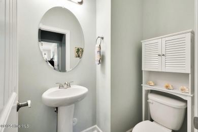 Welcome to this breathtaking 5-bedroom retreat, perfectly on Beau Rivage Golf and Resort in North Carolina - for sale on GolfHomes.com, golf home, golf lot