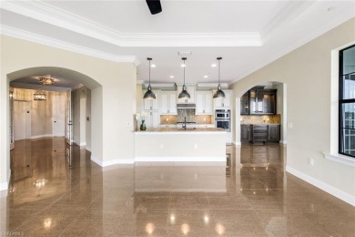 As you enter the foyer from the private elevator, you will be on The Colony Golf and Country Club in Florida - for sale on GolfHomes.com, golf home, golf lot