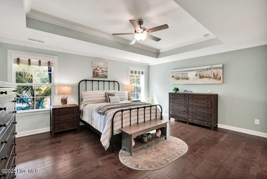 Welcome to this breathtaking 5-bedroom retreat, perfectly on Beau Rivage Golf and Resort in North Carolina - for sale on GolfHomes.com, golf home, golf lot