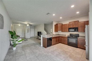Welcome to 12952 Utopia Gardens Way - Tranquil Living with Water on Summerfield Crossing Golf Club in Florida - for sale on GolfHomes.com, golf home, golf lot