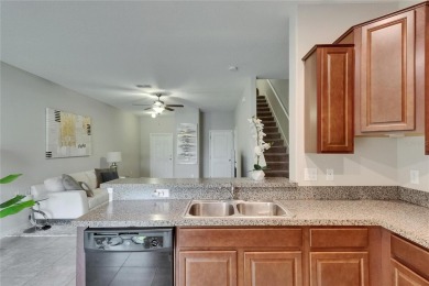 Welcome to 12952 Utopia Gardens Way - Tranquil Living with Water on Summerfield Crossing Golf Club in Florida - for sale on GolfHomes.com, golf home, golf lot