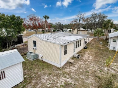 SNOWBIRDS OR HOMEOWNERS WELCOME- YOU OWN the land. 2 Bedroom on Glen Lakes Country Club in Florida - for sale on GolfHomes.com, golf home, golf lot