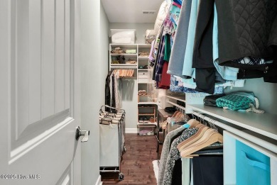 Welcome to this breathtaking 5-bedroom retreat, perfectly on Beau Rivage Golf and Resort in North Carolina - for sale on GolfHomes.com, golf home, golf lot