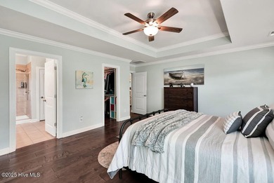 Welcome to this breathtaking 5-bedroom retreat, perfectly on Beau Rivage Golf and Resort in North Carolina - for sale on GolfHomes.com, golf home, golf lot