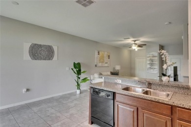 Welcome to 12952 Utopia Gardens Way - Tranquil Living with Water on Summerfield Crossing Golf Club in Florida - for sale on GolfHomes.com, golf home, golf lot
