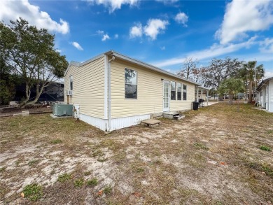 SNOWBIRDS OR HOMEOWNERS WELCOME- YOU OWN the land. 2 Bedroom on Glen Lakes Country Club in Florida - for sale on GolfHomes.com, golf home, golf lot