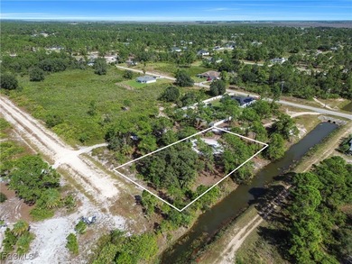 Build your dream home on this beautiful half-acre homesite on Lehigh Resort Club in Florida - for sale on GolfHomes.com, golf home, golf lot