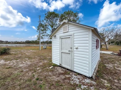 SNOWBIRDS OR HOMEOWNERS WELCOME- YOU OWN the land. 2 Bedroom on Glen Lakes Country Club in Florida - for sale on GolfHomes.com, golf home, golf lot