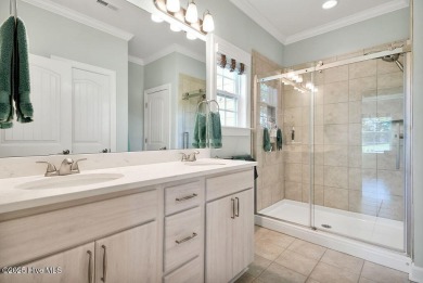 Welcome to this breathtaking 5-bedroom retreat, perfectly on Beau Rivage Golf and Resort in North Carolina - for sale on GolfHomes.com, golf home, golf lot