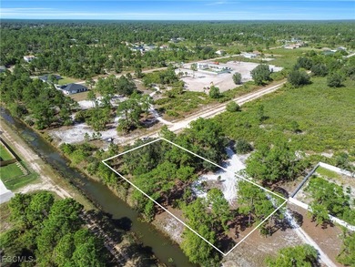 Build your dream home on this beautiful half-acre homesite on Lehigh Resort Club in Florida - for sale on GolfHomes.com, golf home, golf lot