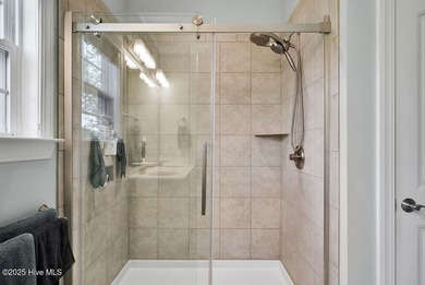 Welcome to this breathtaking 5-bedroom retreat, perfectly on Beau Rivage Golf and Resort in North Carolina - for sale on GolfHomes.com, golf home, golf lot