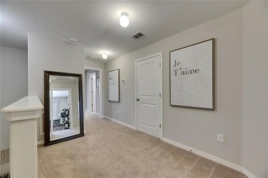 Welcome to 12952 Utopia Gardens Way - Tranquil Living with Water on Summerfield Crossing Golf Club in Florida - for sale on GolfHomes.com, golf home, golf lot