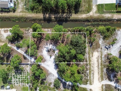 Build your dream home on this beautiful half-acre homesite on Lehigh Resort Club in Florida - for sale on GolfHomes.com, golf home, golf lot