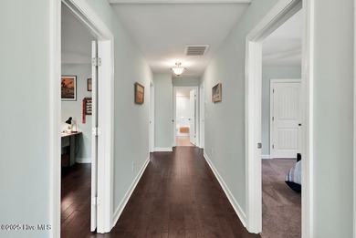 Welcome to this breathtaking 5-bedroom retreat, perfectly on Beau Rivage Golf and Resort in North Carolina - for sale on GolfHomes.com, golf home, golf lot