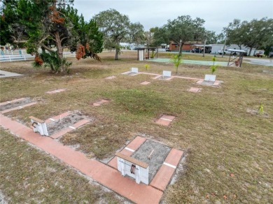SNOWBIRDS OR HOMEOWNERS WELCOME- YOU OWN the land. 2 Bedroom on Glen Lakes Country Club in Florida - for sale on GolfHomes.com, golf home, golf lot