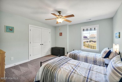 Welcome to this breathtaking 5-bedroom retreat, perfectly on Beau Rivage Golf and Resort in North Carolina - for sale on GolfHomes.com, golf home, golf lot