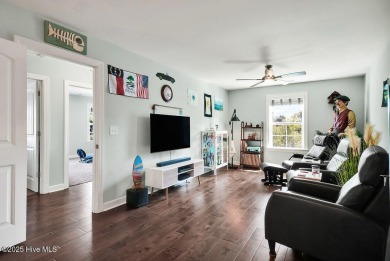 Welcome to this breathtaking 5-bedroom retreat, perfectly on Beau Rivage Golf and Resort in North Carolina - for sale on GolfHomes.com, golf home, golf lot